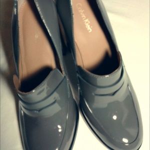 woman's high heel shoes gray